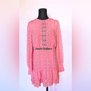 A long-sleeve dress constructed from clipdotted chiffon features sheer lace trim